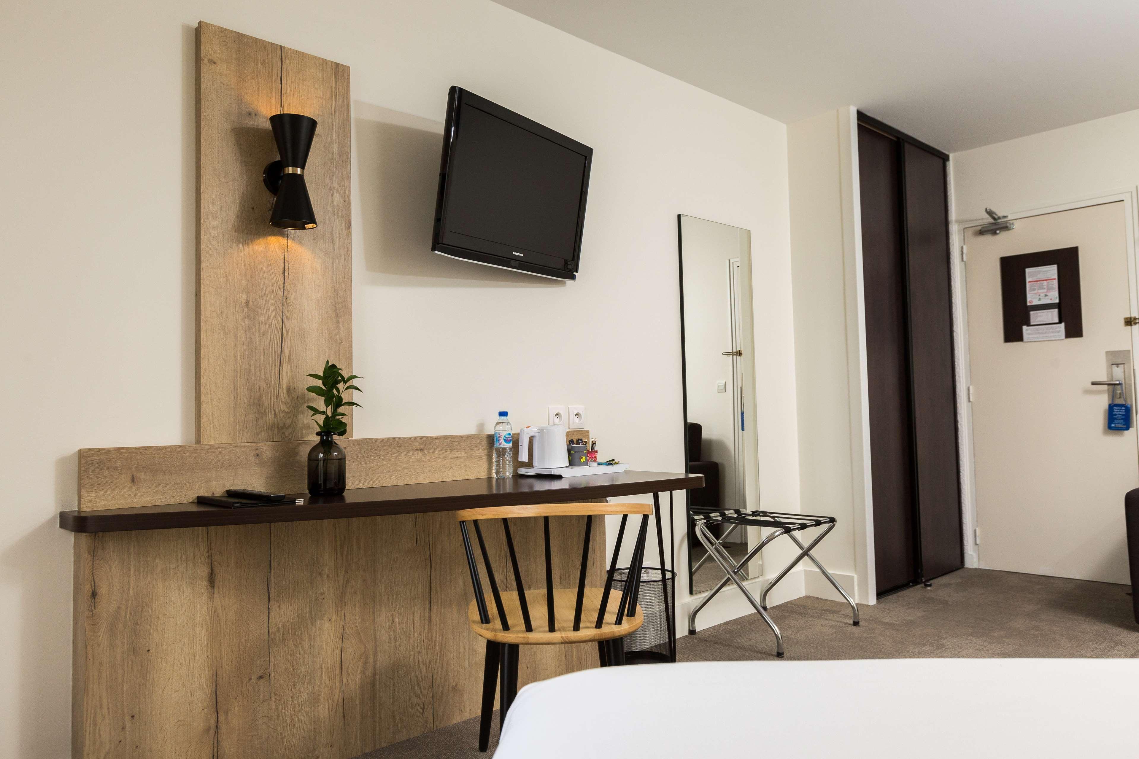 Best Western Le Bois De La Marche Liguge Екстер'єр фото